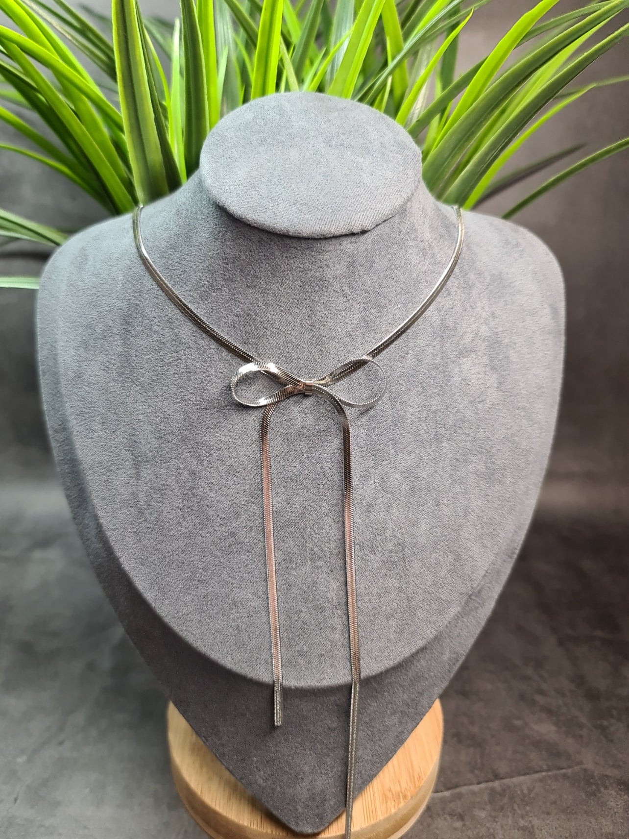 Bow, silver necklace image 0