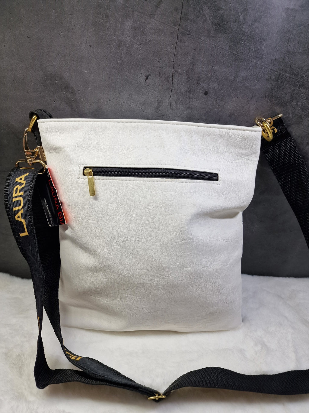 Laura Biaggi checkered, cross body bag in white and black image 1