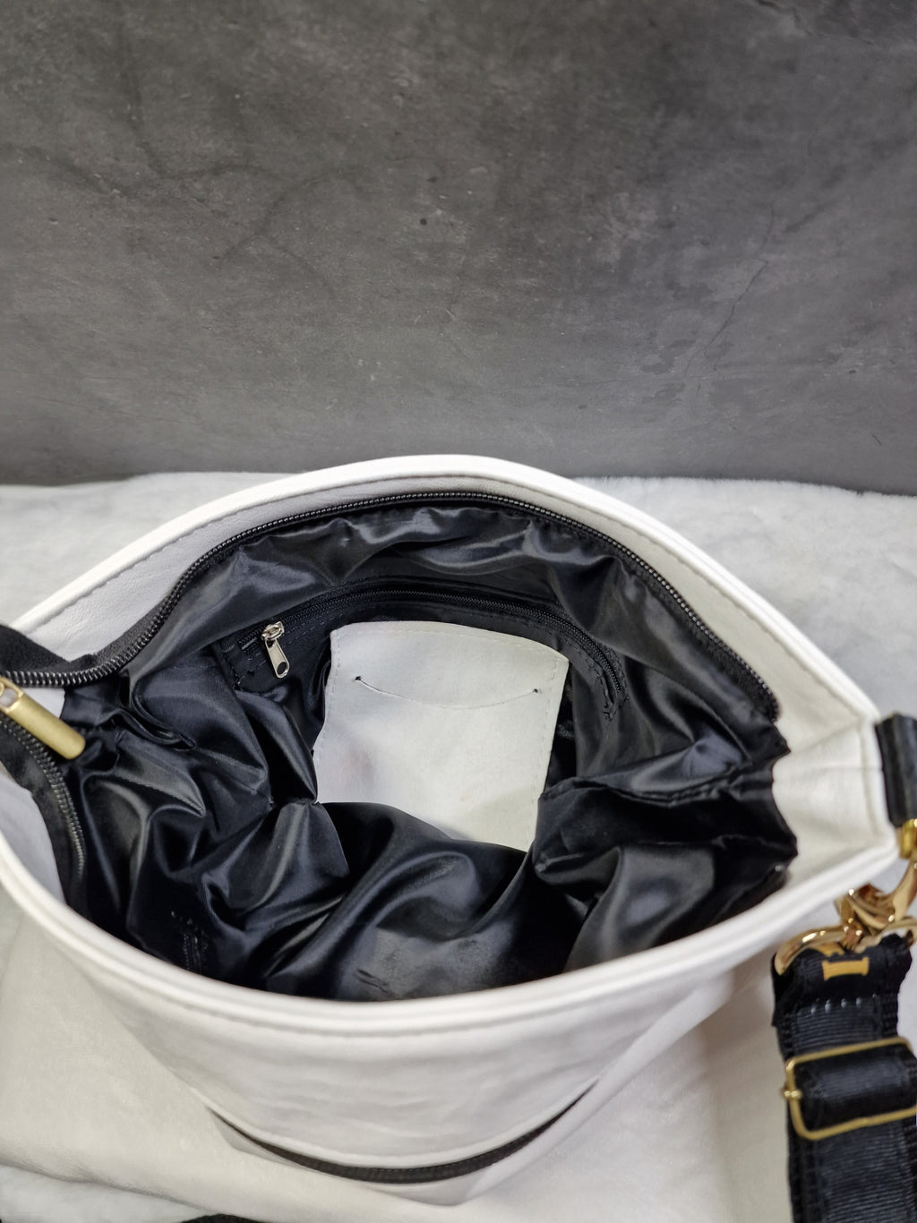 Laura Biaggi checkered, cross body bag in white and black image 2