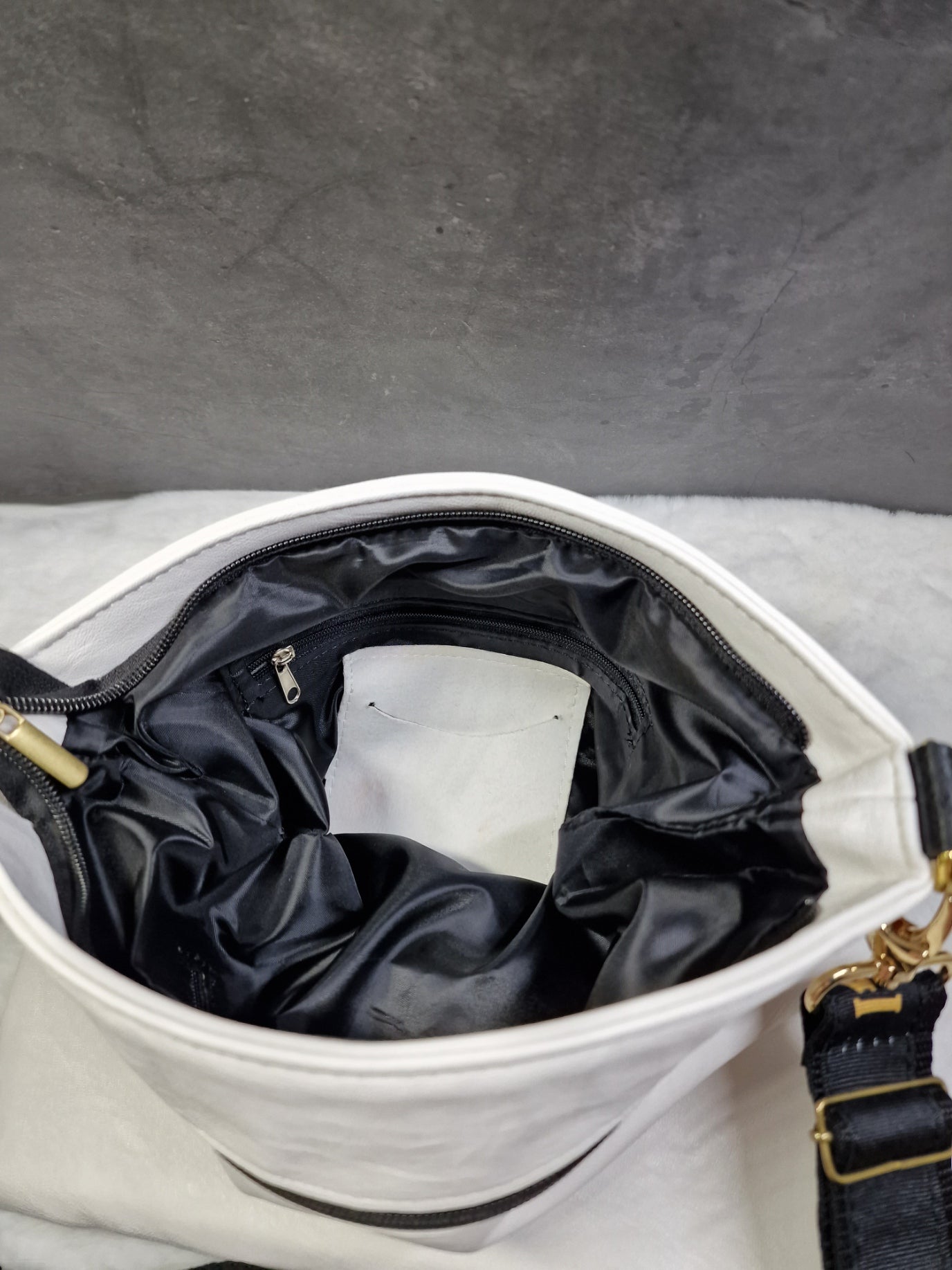 Laura Biaggi checkered, cross body bag in white and black image 2