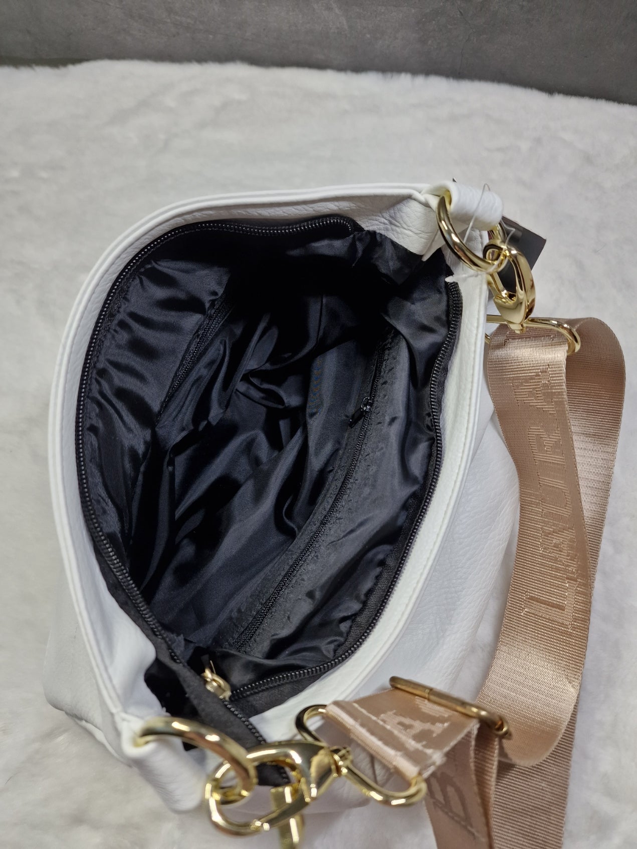 Laura Biaggi cross body bag in white image 2