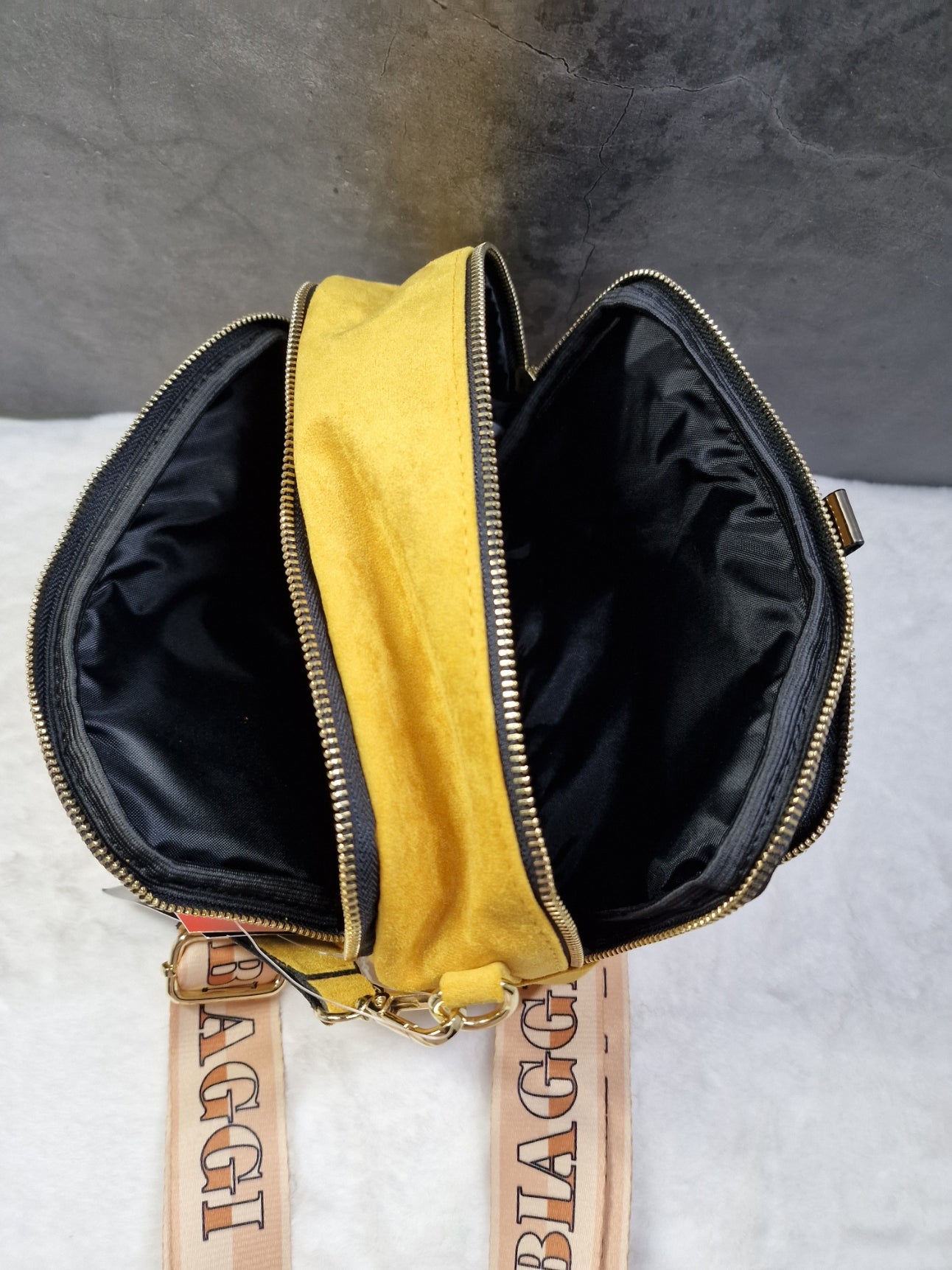 Laura Biaggi small, cross body bag in mustard image 2