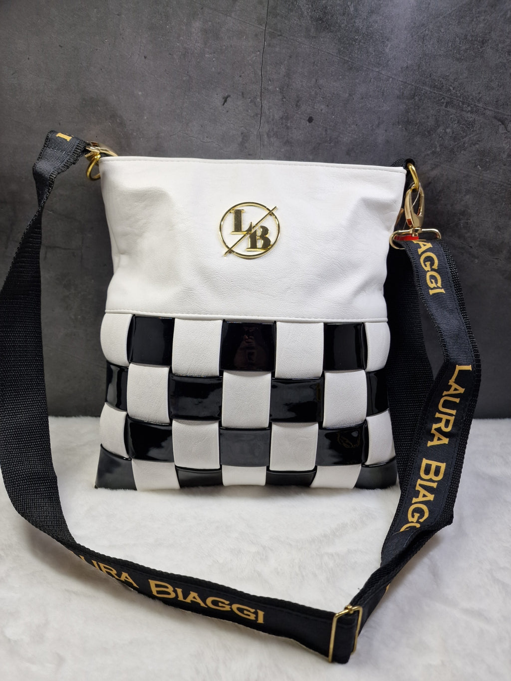 Laura Biaggi checkered, cross body bag in white and black image 0