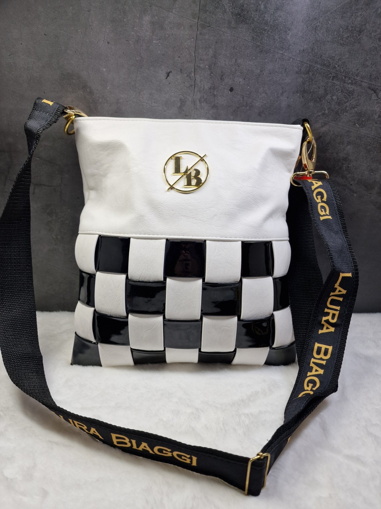 Laura Biaggi checkered, cross body bag in white and black image 0